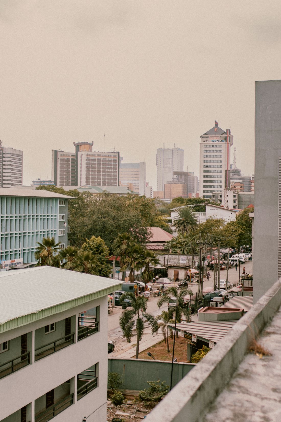 A street view of Lagos with city buildings in the background